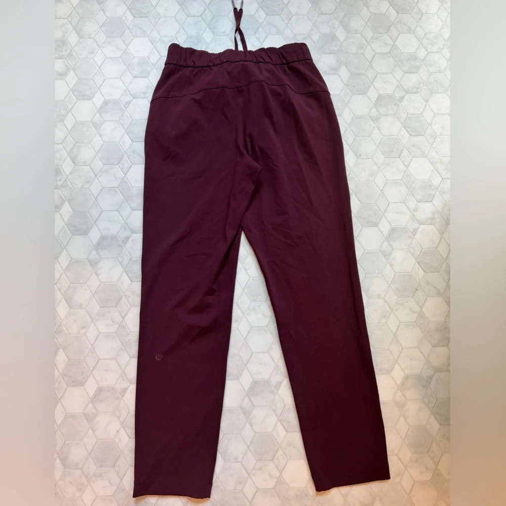 Lululemon On the Fly 7/8 Pants Dark Adobe Maroon Size 4 EUC